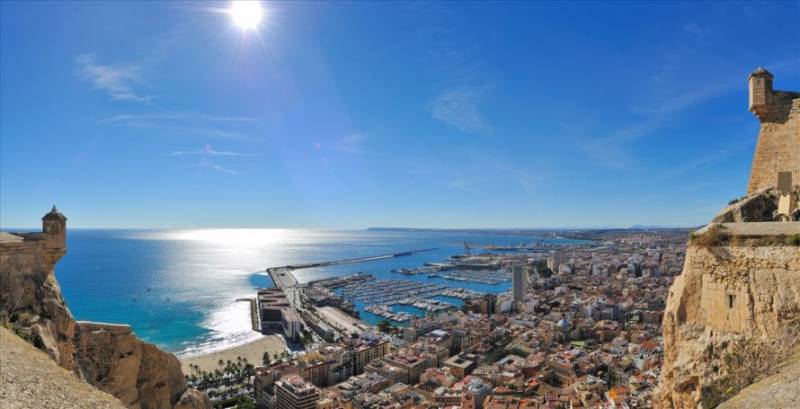 View of Alicante leisure harbour and seafront promenade in Costa Blanca.