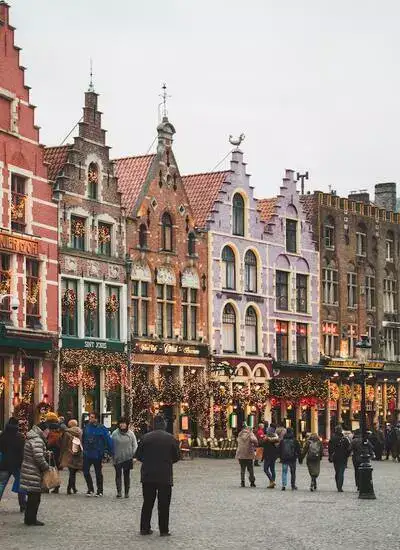 Traditional houses in Bruges with Christmas decorations.