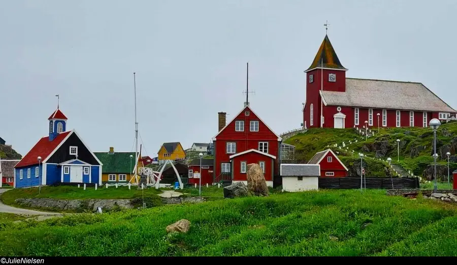 Sisimiut's colonial houses, the Blue Church, the Governor's House, and the Zion Church.