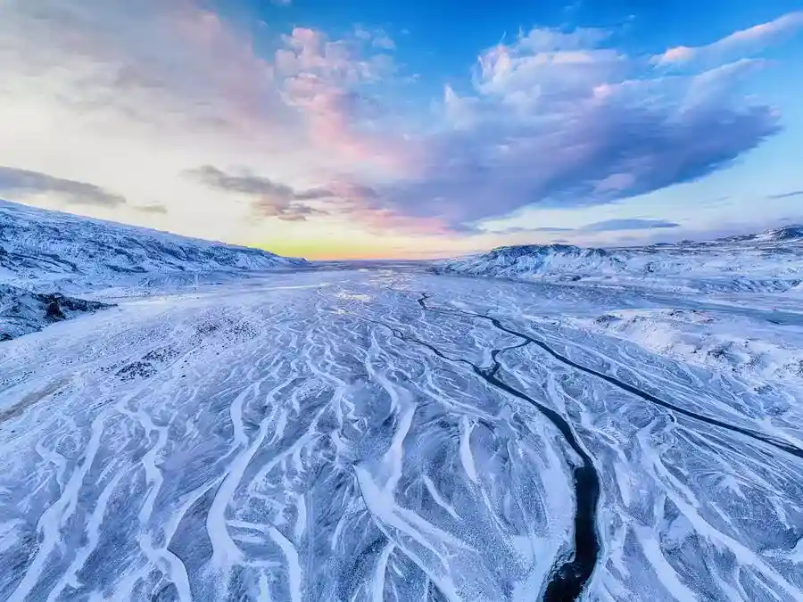 Midnight sun over a glacier in Iceland.