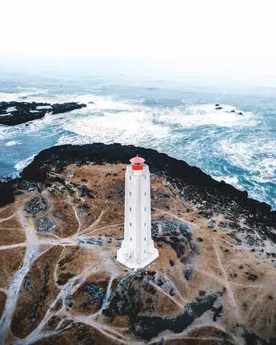 Aerial view of Reykjavik´s Grotta lighthouse overlooking the ocean.