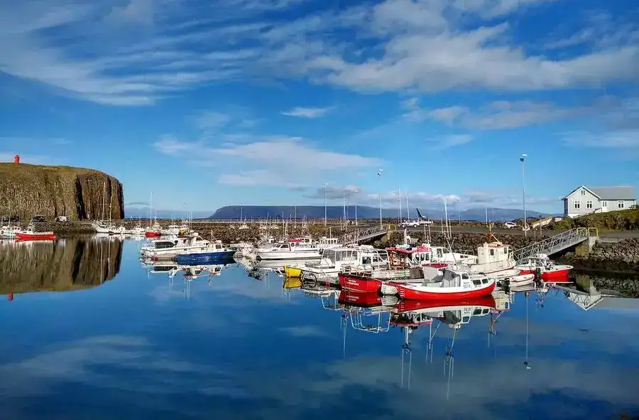 Colorful fishing boats in Stykkishólmur harbor on Breiðafjörður Bay. 