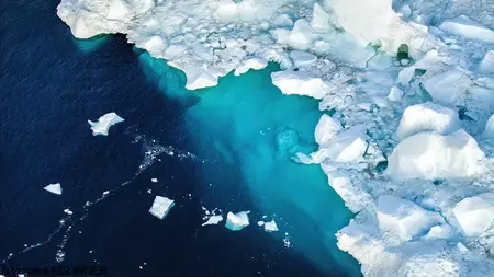 Icebergs calving in Ilulissat Icefjord, Greenland.