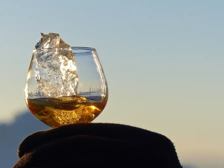 A glass of whisky with a 3000-year-old chunk of glacier ice.