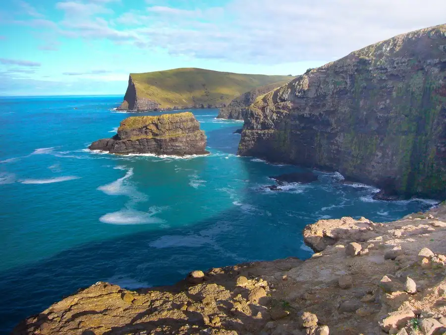 Akaroa coastline with cliffs and ocean.