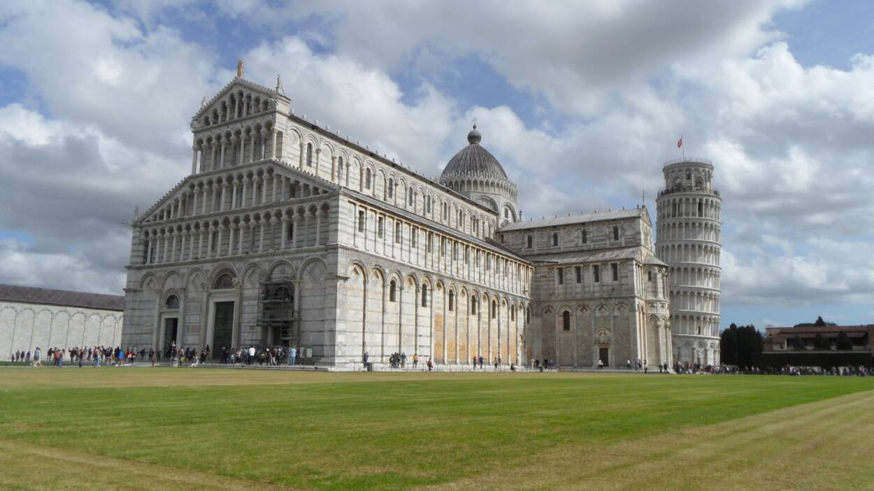 Pisa cathedal, the leaning tower and bapistery dome in the field of miracles.