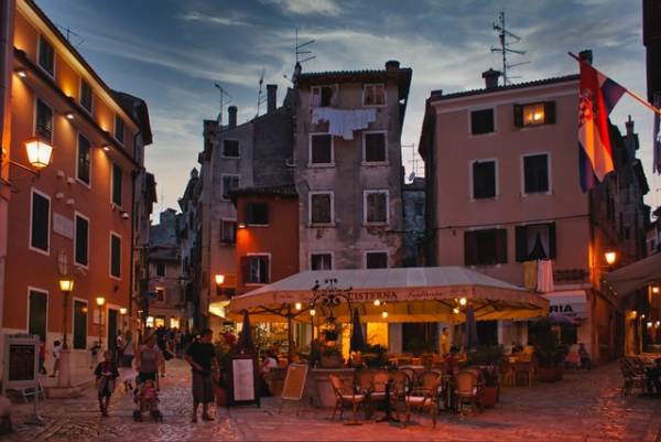 Street cafés in the evening in Rovinj, Croatia..