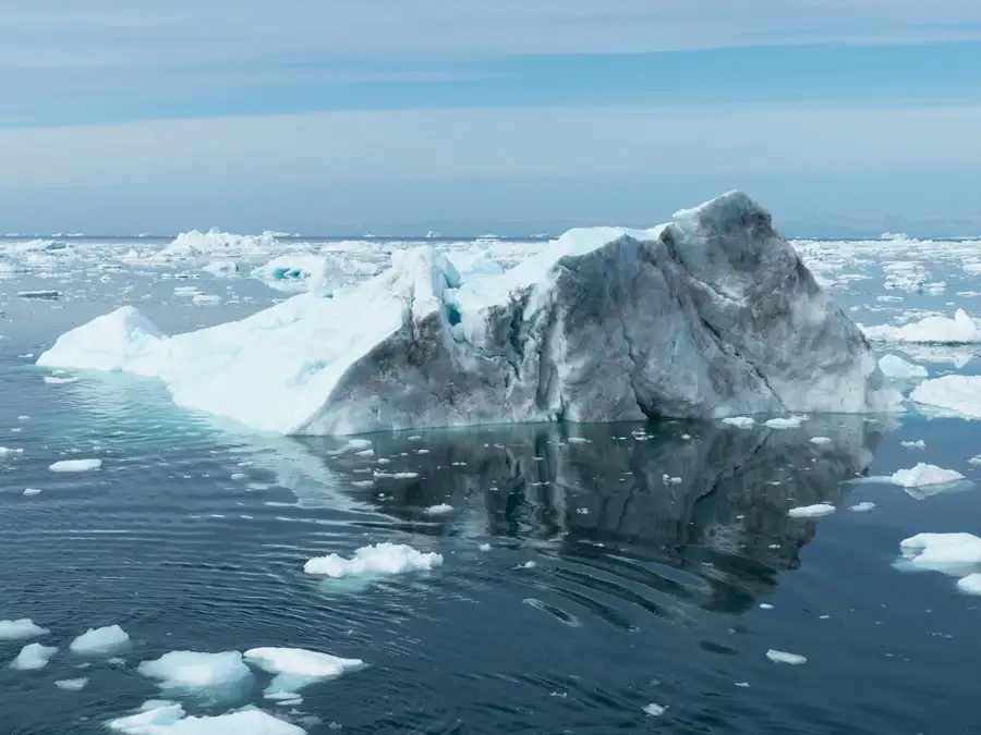 Icebergs in the ice field off Greenland's coast seen from the Sarfaq Ittuk passenger ferry.