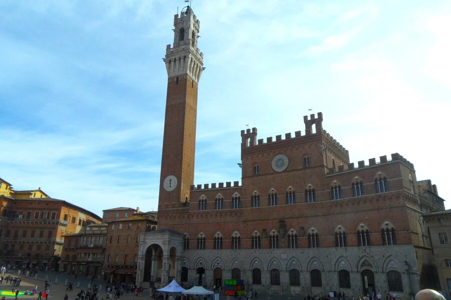 Palazzo Pubblico with Torre del Mangia is the highlight of a Siena walking itinerary.
