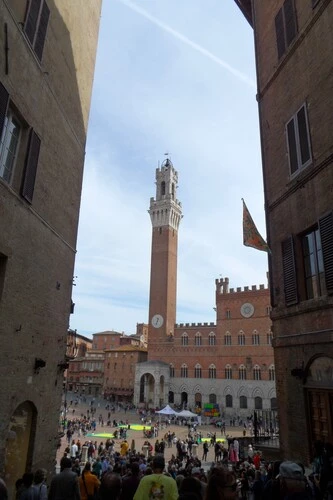 The top site of Siena is Torre del Mangia tower in Piazza di Campo main square.