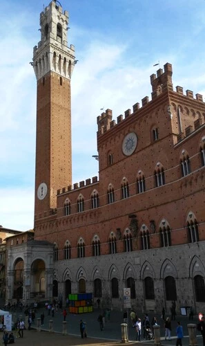 A must-see on a 1 day Siena itinerary is Palazzo Pubblico with Mangia Tower.