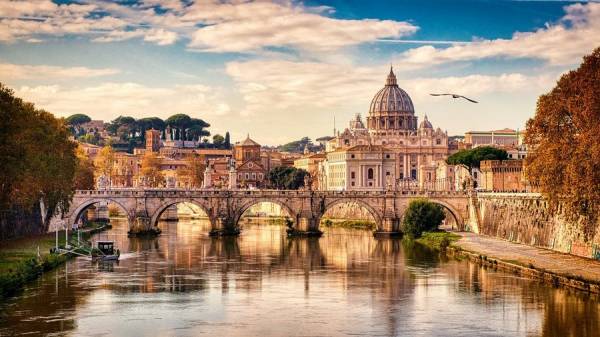 Bridge archways over the river in front of the Vatican.